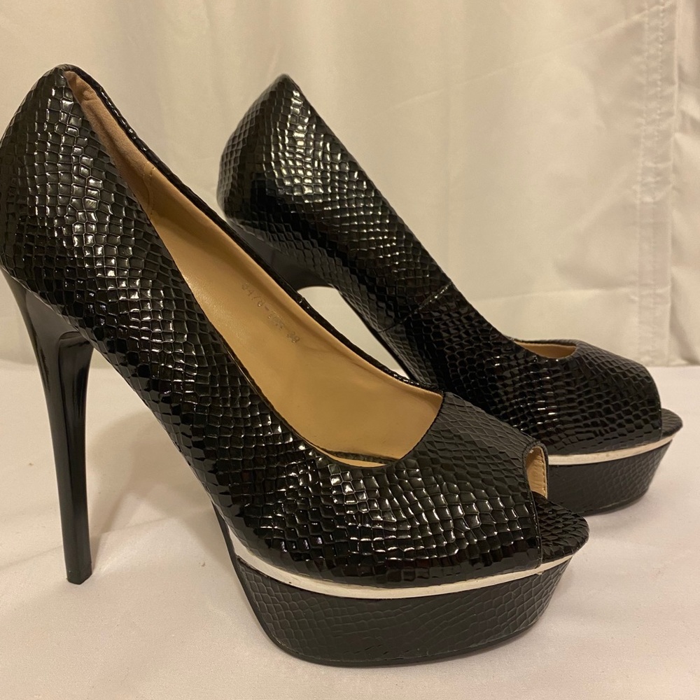Black open toe stilettos.